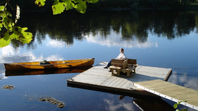 Small floating dock on a calm pond