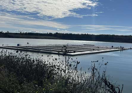 Wide view of a fish farm using floating docks